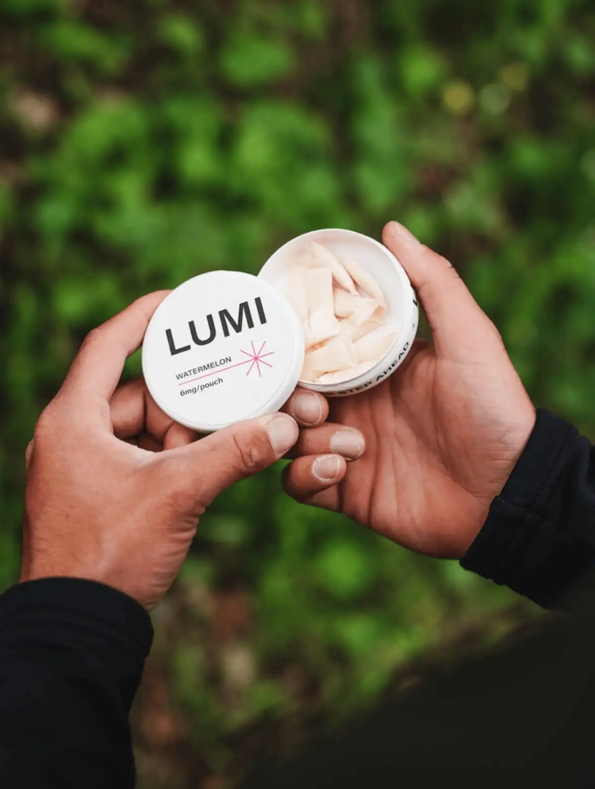 Can of LUMI nicotine pouches
